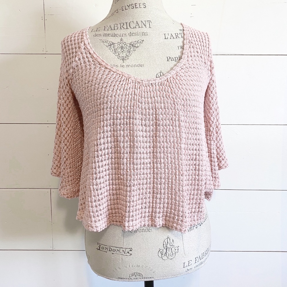 NWOT “Pisces” baby pink bell-sleeve top